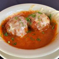 Meatballs With Provolone · 2 Homemade Sicilian Meatballs served in Maggie's Sugo with melted provolone cheese