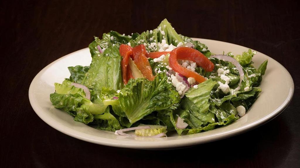 Santa Teresa Salad · Romaine lettuce, red onions, and goat cheese, tossed with a dijon vinaigrette and topped with roasted red peppers