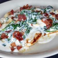 Chicken Carbonara · Grilled with parmigiano cheese, prosciutto ham, spinach and artichoke hearts topped with car...