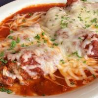 Veal Parmigiano · Breaded and sauteed in Maggie's Sugo and melted fontina cheese
