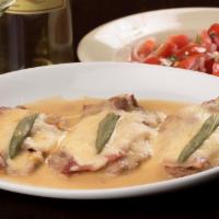 Veal Saltimbocca · Sauteed, baked and topped with prosciutto, sage and melted fontina cheese in a brown wine sa...