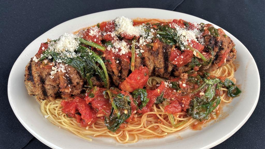 Beef Spiedini Georgio · Beef tenderloin Spiedini.  Served with crushed tomatoes, basil, garlic, spinach and olive oil over angel hair with romano cheese