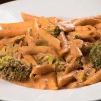 Pasta Con Broccoli All Balano · Steamed broccoli and sauteed mushrooms in a tomato cream sauce tossed with parmigiano cheese