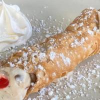 Cannoli · Light pastry shell filled with sweet ricotta, almonds, chocolate chips and diced cherries