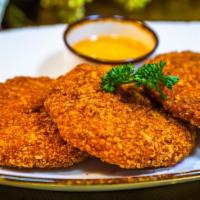 Shrimp Cake · Finely minced shrimp breaded, fried until golden brown and served with Thai plum sauce.