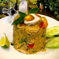 Green Curry Fried Rice · Stir fried shrimp and chicken with jasmine rice, a mixture of green curry paste to enhance t...
