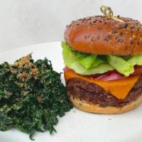 Vegan Double Cheeseburger · house-made with portobello, walnut, beet, lettuce, pickled onion, organic tomato, vegan ched...