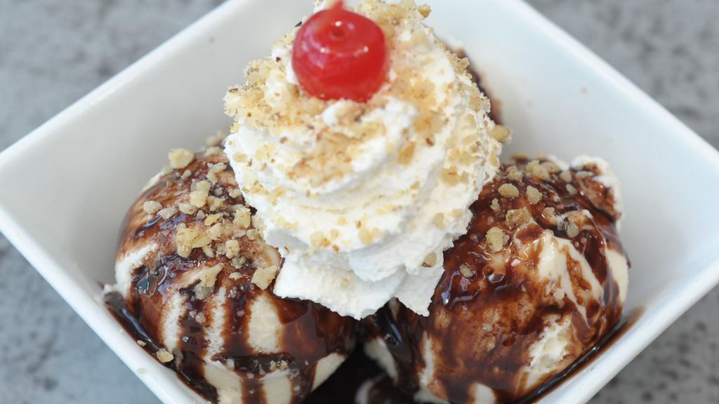 Sundae Confessions
At The Basilica (Fridae) · Tempting scoops of honey vanilla are lavishly covered in hot fudge and then crowned with whipped cream, nuts and a cherry. Hail mary.
