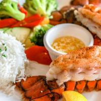 Twin Lobster Tails · Old Bay Butter Sauce Served with Rice & Veggies