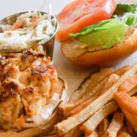 Crab-Cake Sandwich · Jumbo Lump Crab Cake served with lettuce, tomato, onions and remoulade sauce, Coleslaw, spic...