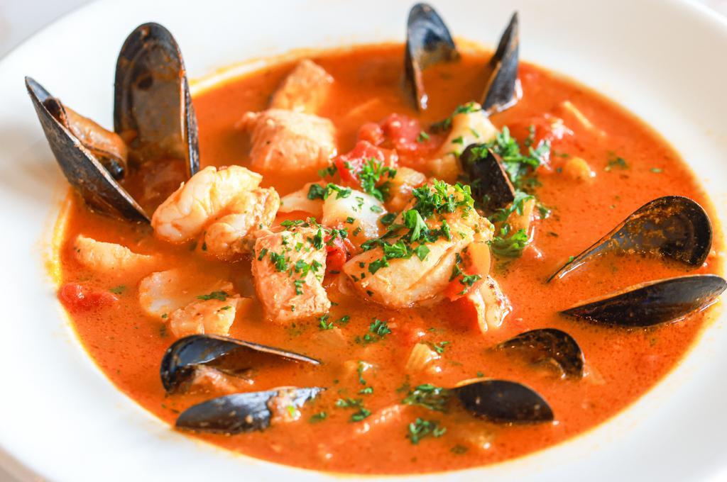 Ocean Paradise Bouillabaisse · Fish, mussels, shrimps and saffron tomato base
