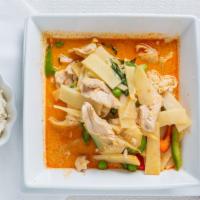 Pad Phed (Red Curry) · Hot. Sweet red and green peppers, bamboo shoots, chili herbs, and fresh basil in coconut milk.