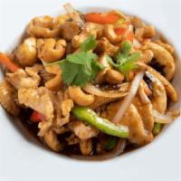 Cashew Nuts  · Stir-fried roasted cashew nuts, onions, green onions, mushroom, bell pepper, carrot, baby co...
