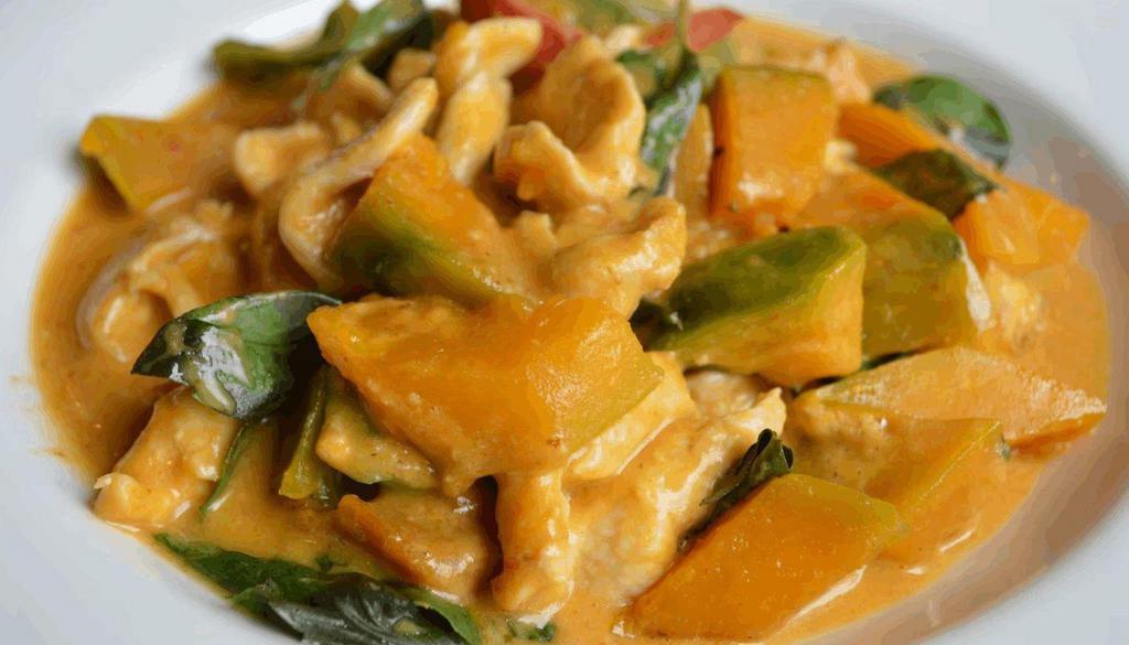 Pumpkin Curry · Red curry paste cooked with coconut milk, pumpkin, bell peppers and sweet basil
