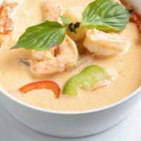 Pineapple Curry · Red curry sauce cooked with pineapple, bell peppers and sweet basil