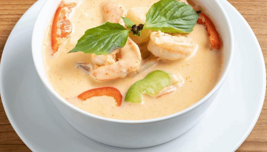 Pineapple Curry · Red curry sauce cooked with pineapple, bell peppers and sweet basil