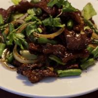 Garlic Green Beans · Stir-fried fresh green beans and onions with delicious garlic sauce