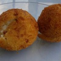 Papas Rellenas · Two potato balls filled with beef.