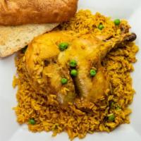 Arroz Con Pollo · Yellow rice and savory half-chicken blended with paprika, olive oil, peas, Spanish pimentos,...