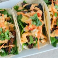 Hawaiian Taco (3) · Fresh pineapple, carrot, onion, tomato, cucumber, spinach, scallion with lime and our spicy ...