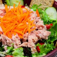 Tuna Salad · Mixed greens, tuna, tomatoes, cucumbers, carrots, and whole wheat crackers.