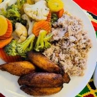 Vegan Plate   · vegan meal: 
rice and beans, plantains, or Yoga tomato  onion sauce