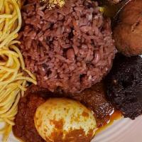 Ayimolou (Togo) · Comes with Chicken or fish, boiled egg, spaghetti, plantain. and spicy onion and Tomato sauce