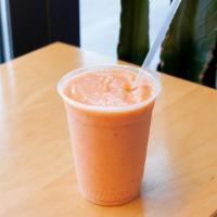 Lady Of The Day · Made with strawberries, pineapple, banana, orange juice, dates, and ice.