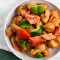 Sweet And Sour Chicken · Deep-fried boneless chicken garnishes with onion, carrots & green pepper in sweet & sour sau...