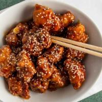 Sesame Chicken · Chunks of chicken, marinated breaded and fried until crispy, blend with our chef's sesame se...