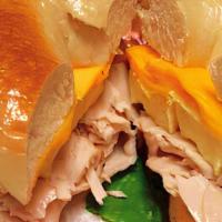 Turkey, Egg & Cheese Sandwich · Turkey, egg, and American cheese on your choice of bread.