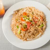 Thai Fried Rice · Onion carrot, tomatoes, scallions and egg.