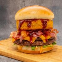 Bbq Bacon Cheeseburger · Two 3oz. ground beef patties topped with bacon, an onion ring, sherry onions, AEB sauce, tom...