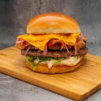 Truffle Burger · Two 3oz. ground beef patties with cured Applewood bacon, truffle mayo, cheddar cheese, lettu...