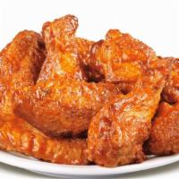 Chicken Wings · Seasoned and deep fried chicken wings. Have 'em naked or pick a sauce. All of our wings are ...
