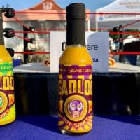 Headlock Sauce Pack · Get 3 award winning Texas hot sauces.