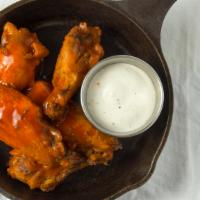 Tavern Wings · Choice of Sauce: Buffalo, TBS BBQ Sauce, Maple Dijon, Chile Límon Dry Rub.