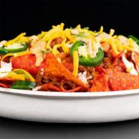 Doritos Flamin' Hot Chorizo Nachos · Featuring Doritos Flamin' Hot Nacho Cheese chips smothered in zesty queso, our new spicy cho...