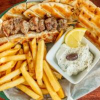 Souvlaki Platter · Choice of 2 chicken or 2 pork skewers, served with french fries, small greek salad, pita wed...