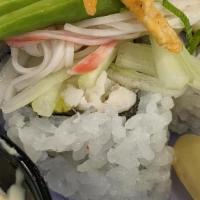 Crabocado Yama Maki · Lump Crab and Avocado roll topped with Cucumber, Kanikama, Avocado, Scallion, Old Bay Potato...