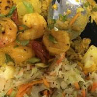 Curry Shrimp · Shrimp cooked in a spiced curry with coconut milk and herbs and spices. Served with rice and...