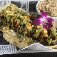 Vegetarian Tacos · Faux Jerk Chicken. 3 tacos w/ avocado creme, pineapple pico and cabbage on a flour tortilla(...
