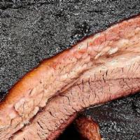1/2 Lb Brisket · Our brisket is marinated, and rubbed with southern spices, then smoked on unique flavor wood...