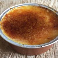 Crème Brulee · With Vanilla Bean Custard and Caramelized Sugar.