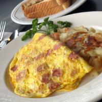 Ham & Four Cheese Omelet · Honey glazed ham, with swiss, mozzarella, American, and jack cheeses.