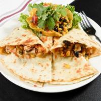 Chicken Fajita Quesadilla · Your choice of chicken or beef, with peppers, onions, and cheddar cheese, served with sour c...