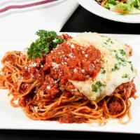 Chicken Parmesan · Lightly breaded and seasoned breast of chicken, baked with mozzarella cheese and topped with...