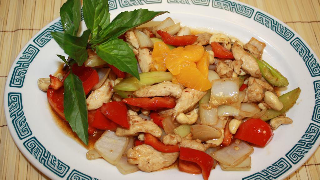 Cashew Chicken · Gluten-free. Chicken stir-fried in our special house sauce, tangy mandarin orange, crisp celery, sweet bell pepper, tasty onions, all topped with cashew nuts.