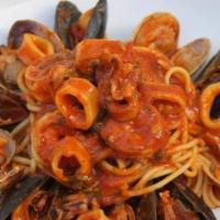 Spaghetti Pescatore · Shrimp, clams, mussels, calamari, and tomato broth.