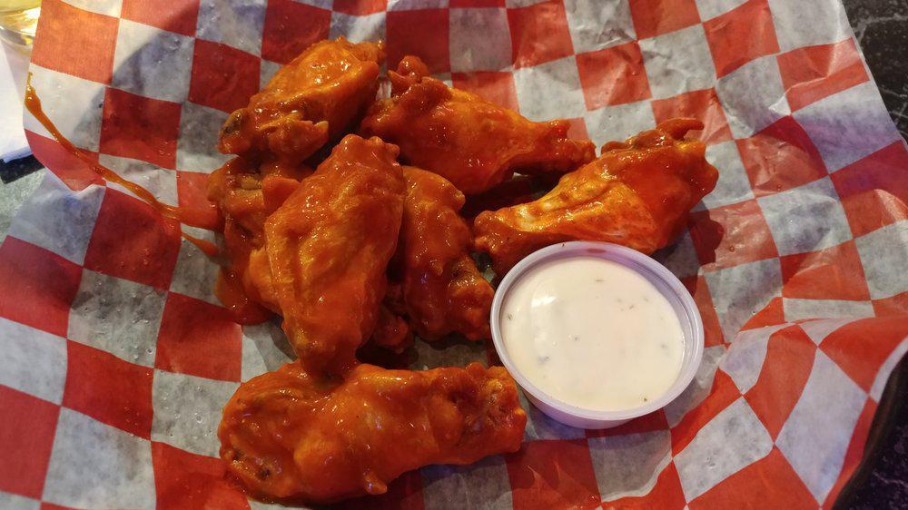 Wings From Planet X · Thank goodness every chicken on Planet X has 25 wings because we've served over a gazillion wings to our customers all across the universe. Breaded upon request.